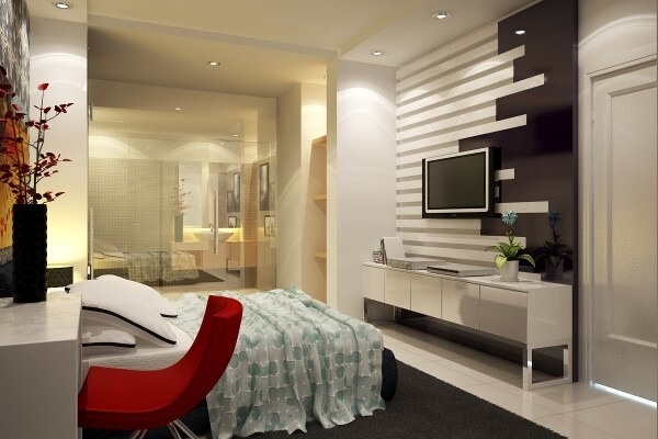 Phòng ngủ master nhỏ với kệ tivi, bàn trang điểm, giường ngủ, hệ tủ chìm và phòng tắm vách kính mờ.