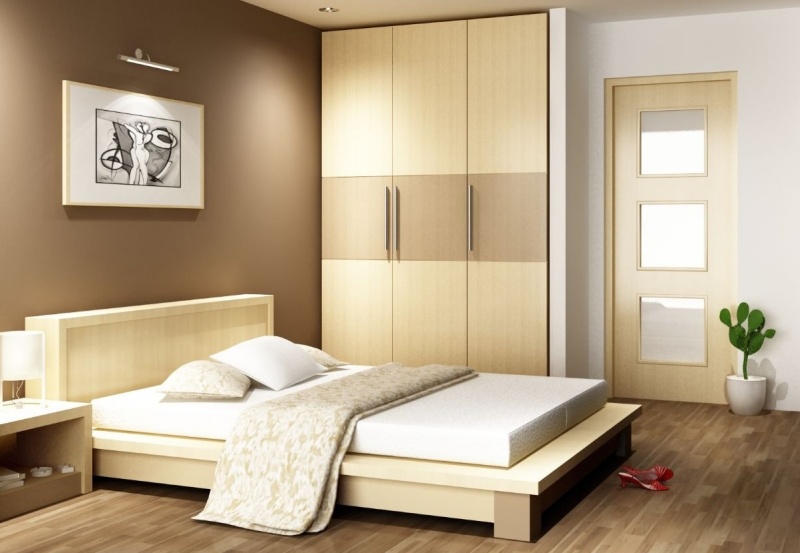 Đặt giường ngủ sát tường giúp dễ dàng hơn trong việc trang trí nội thất ngăn nắp, gọn gàng